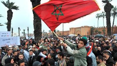 Moroccans demonstrate in Rabat demanding political reform and limits on the powers of the king.