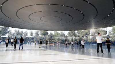 People await the start of a product launch event at Apple's new campus in Cupertino, California. Stephen Lam / Reuters