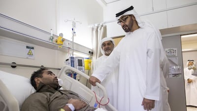 The Crown Prince visits another serviceman at Mafraq Hospital.