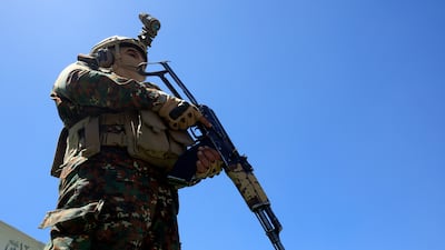 A Houthi soldier stands guard at a rally in Sanaa, Yemen's rebel-held capital. EPA
