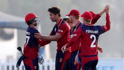 Ben Stevens, centre, led the way as Jersey defeated the UAE by 35 runs in the T20 World Cup qualifier in Abu Dhabi. All photos by Pawan Singh / The National