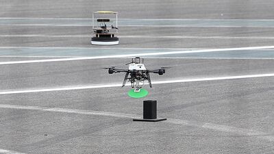 The ETH Zurich team’s drone is flown during the Mohammed Bin Zayed International Robotics Challenge in Abu Dhabi. Pawan Singh / The National