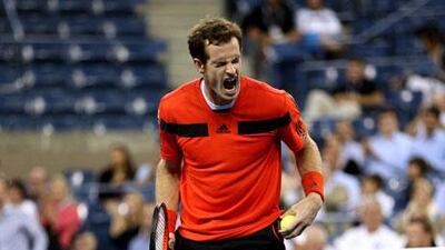 Andy Murray, the defending champion, came from a set down to beat Denis Istomin in four. Clive Brunskill / Getty Images / AFP