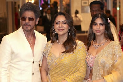 Shah Rukh Khan with his wife Gauri and daughter Suhana. AFP