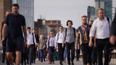 Commuters on London Bridge. Employers and professionals hope they will have one less crossing a week. PA