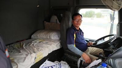 For Damar Jang Gurung, a 50-year-old lorry driver from Nepal, his vehicle is his home. Ravindranath K / The National