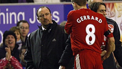Rafa Benitez, left, looks on as his captain Steven Gerrard, centre, is substituted after 16 minutes in Liverpool's extra-time defeat to Everton in the FA Cup fourth round replay.