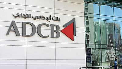 Abu Dhabi Commercial Bank yesterday announced it was suing Credit Suisse and Standard and Poor’s.