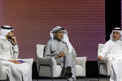 From left, Anas Bukhash, host of ABtalks, Mohamed Alabbar, Emaar founder, and Abdul Aziz Al Ghurair during a panel at Make it in the Emirates on Monday. Antonie Robertson / The National