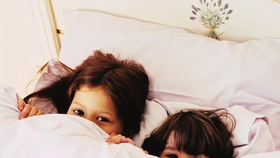 Tackle scary subjects with kids by conversing with them in a grown-up way Getty