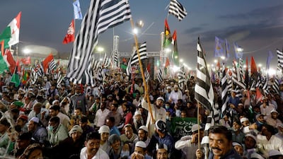 Supporters of Pakistan Democratic Movement, an alliance of political opposition parties, attend a rally in Karachi on October 18, 2020. Reuters