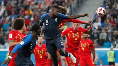 France's Samuel Umtiti heads the ball to score the opening goal. AP Photo
