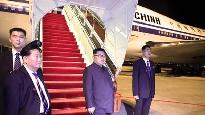 North Korean leader Kim Jong-un boarding an Air China aircraft after the Singapore summit. Singapore Ministry of Communications / EPA