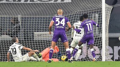 Alex Sandro scores an own goal to give Fiorentian a two-goal lead. EPA