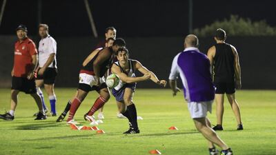 The UAE national rugby team training at the Centre for Excellence at Jebel Ali in Dubai on April 15, 2014. Sarah Dea / The National