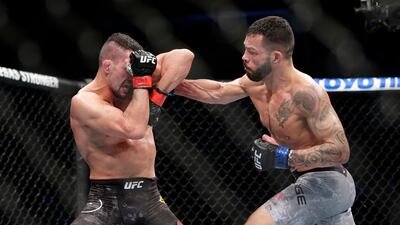 Mirsad Bektic, left, and Dan Ige during their featherweight bout at UFC 247 in Houston. AP