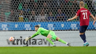 Norway goalkeeper Orjan Nyland attempts to save Benjamin Sesko's winning goal. AP