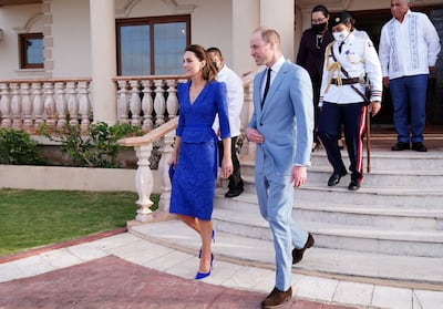 Britain's Prince William and Catherine, Duchess of Cambridge, walk after a meeting with Belize's Prime Minister Johnny Briceno, as they begin their tour of the Caribbean. Reuters