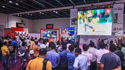 Visitors enjoy watching matches on a giant screen while shopping at GITEX Shopper Spring. Courtesy: Dubai World Trade Centre