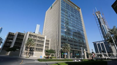 Standard Chartered Tower in Emaar Square, Dubai. The bank has been overhauling its business around the world over the past year in a bid to help it reduce costs by $1.8 billion and return to profit. Victor Besa for The National
