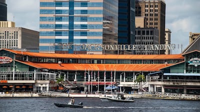 The coast guard patrols the St John's river outside of the Jacksonville Landing. AP Photo