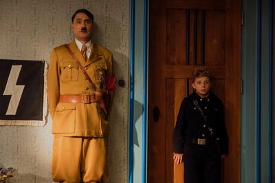 Taika Waititi and Roman Griffin Davis in a scene from 'Jojo Rabbit.' AP