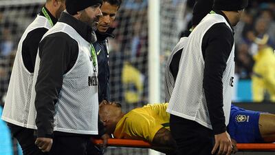 Gabriel Jesus is taken off the field during Brazil's friendly international against Argentina at the MCG in Melbourne on June 9, 2017. The Manchester City forward is said to have a broken eye socket. Saeed Khan / AFP