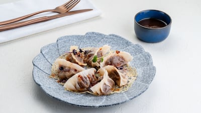 The buttery beef gyoza come with a nori salt crust. Photo: Ribambelle