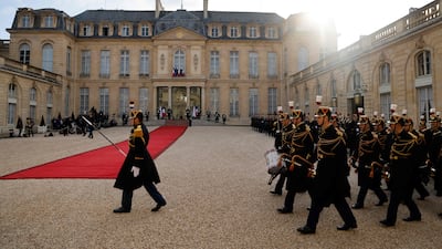 The Republican Guard Orchestra prepares for the arrival at the Elysee Palace. AFP