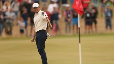 Rory McIlroy after missing a putt on the 15th green during the final round of the Open. AP