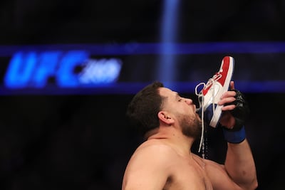 Tai Tuivasa enjoys a 'Shoey' after his victory over Augusto Sakai at UFC 269 at T-Mobile Arena in Lasvegas in December, 2021. AFP