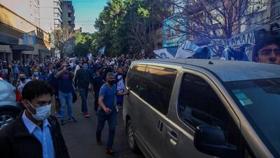 Fans of Diego Maradona show their support as Maradona is transferred from La Plata to Buenos Aires for his operation. EPA