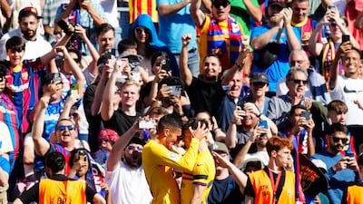 Barcelona's Ferran Torres celebrates with Gavi after scoring. AFP