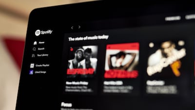 The Spotify website home screen on a laptop computer. Bloomberg