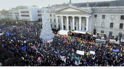 Protesters rally yesterday in central Dublin in the first large public display of anger over spending cuts and tax increases.