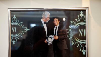 Asigned photograph of Sachin Tendulkar.