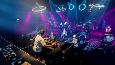 People attend the first 'corona-proof' dance event following the coronavirus disease outbreak in Nijmegen, Netherlands June 6, 2020. Reuters