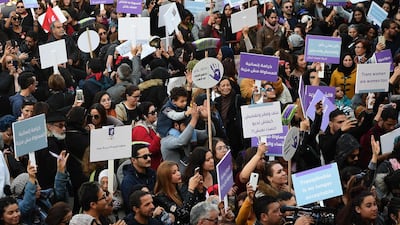 Tunisian women, members of the Tunisian "EnaZeda", (me too in the Tunisian dialect and inspired by the original Metoo movement) carry placards and chant slogans as they rally along with men, against sexual harrasment, in the capital Tunis. AFP