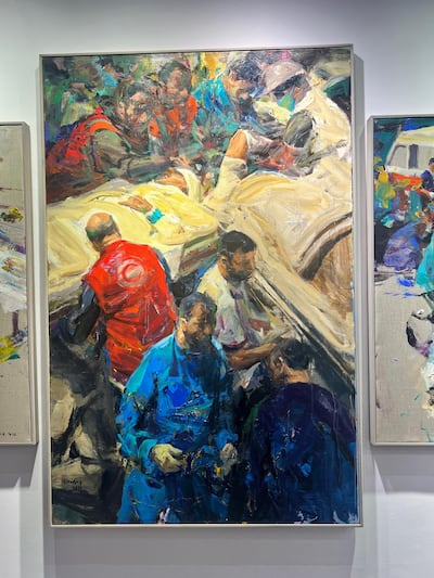 Red Crescent series by Iraqi artist Sewan Baran depicts emergency responders. Saeed Saeed for The National