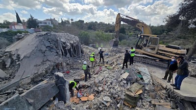 Rescuers search under the rubble at the site of an Israeli bombing near Tyre, Lebanon. AFP