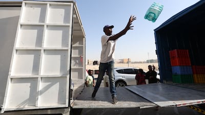 UAE charity The Giving Family prepares to hold an iftar event in Dubai's Al Quoz area. Chris Whiteoak / The National