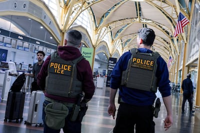 ICE agents patrol at Washington Reagan National Airport in March. Reuters