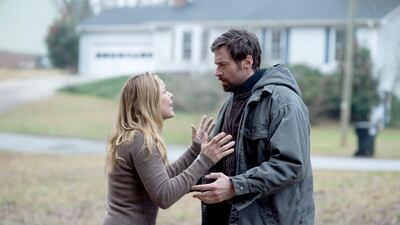 Maria Bello and Hugh Jackman play parents whose daughter vanishes. Wilson Webb / AP Photo / Warner Bros. Pictures