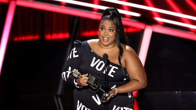 Lizzo accepts the Top Song Sales Artist award onstage at the Billboard Music Awards Reuters