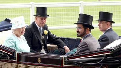 Sheikh Mohammed bin Rashid Al Maktoum, Vice President of the UAE and Ruler of Dubai, arrives at Royal Ascot with the Queen, the Duke of Edinburgh and the Duke of York in the royal carriage.