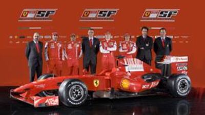 Posing next to the Ferrari F60 from left are: Gilles Simon, the engine department head; Marc Gene', a test driver; Felipe Massa, a driver; Stefano Domenicali, the sporting director; Kimi Raikkonen, a driver; Luca Badoer, a test driver; Nikolas Tombazis, the chief designer and Aldo Costa, the technical director.