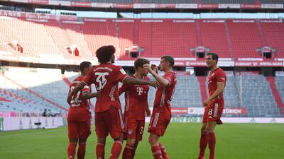 Joshua Zirkzee, second from left, celebrates with teammates after he scores the opening goal for Bayern Munich against Borussia Monchengladbach. AP
