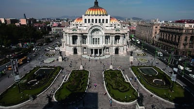 The Palace of Fine Arts in central Mexico City. The capital city sits in a basin encircled by mountains, 2,240 metres above sea level. Susana Gonzalez / Bloomberg