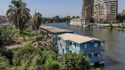 A view from the Giza side of the Nile of houseboats moored by the Umm Kulthum Hotel on Cairo's island of Zamalek days before their expected removal.