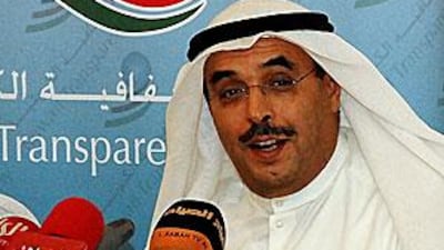 Abdulrahman al Anjari speaks during a meeting of the Kuwait Transparency Society.